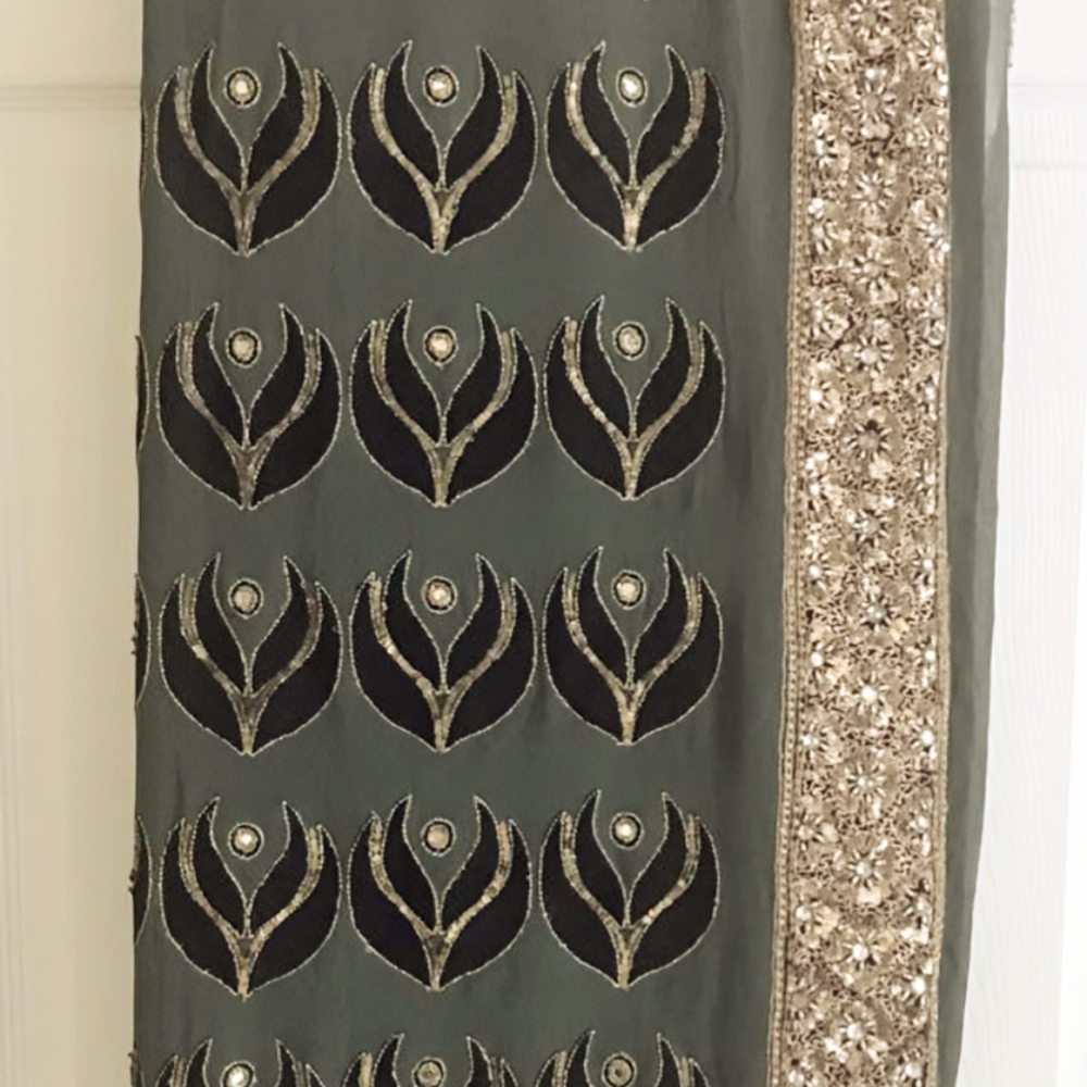 NEW Pure Georgette Saree with all over embroidery and very heavy gold border.